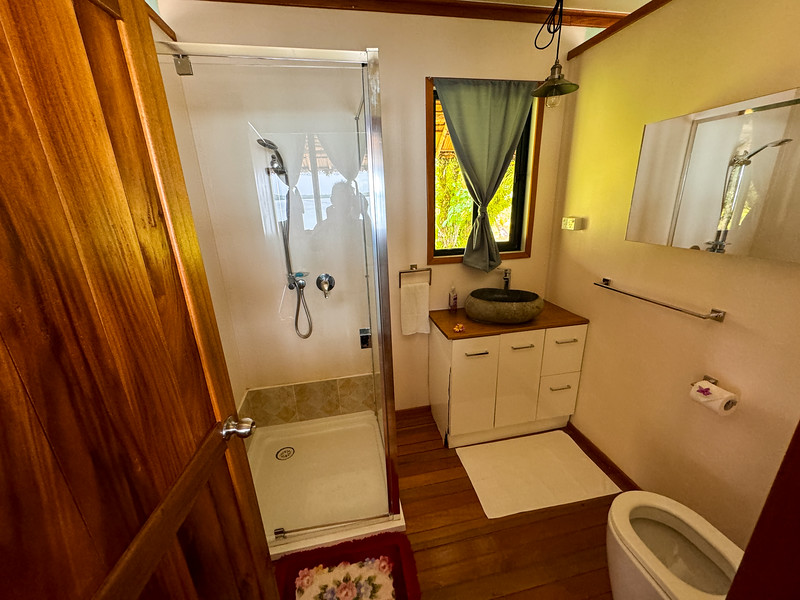Bathroom in beach bungalow at Zipolo Habu Resort, Munda, Solomon Islands