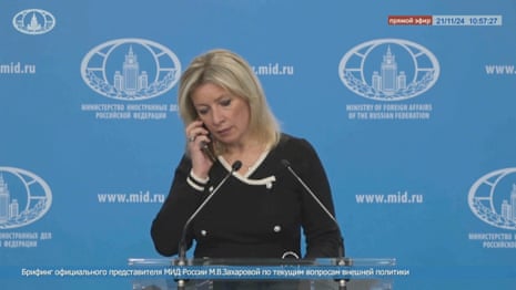 Russian press conference interrupted by call ordering silence on ballistic missiles – video