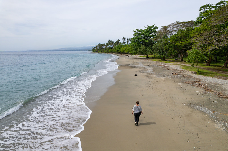 Lina Stock walking Mbonegi Beach on Guadalcanal, Solomon Islands