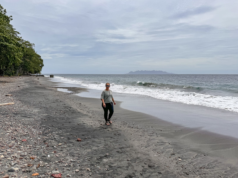 Lina Stock walking the beach at B17 Dive & Beach Bungalows in Guadalcanal, Solomon Islands