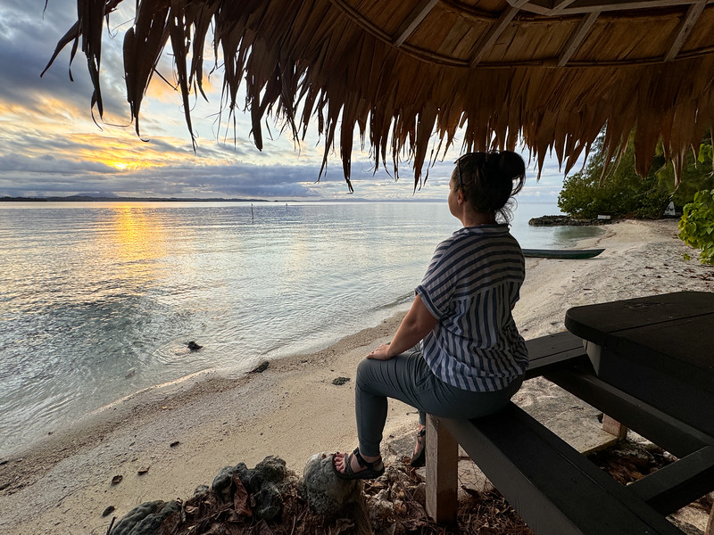 Lina Stock watching the sunset from Kennedy Island in the Solomon Islands