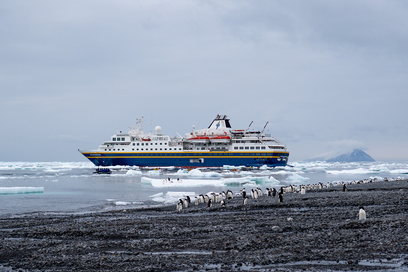 Heritage Adventurer expedition ship off the coast of Cape Bird, Ross Sea, Antarctica