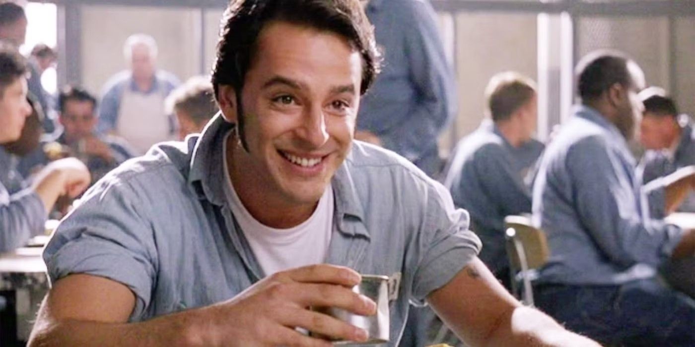 Tommy smiling at the cafeteria in The Shawshank Redemption