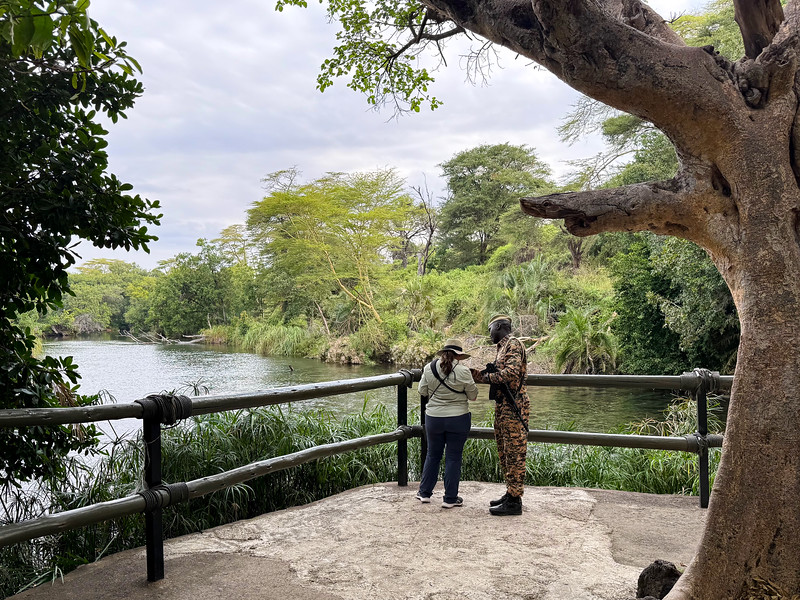 Lina Stock talking to a park ranger in Tsavo West National Park 