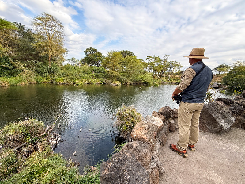 David Stock looking at a pool at Mzima Springs, Kenya