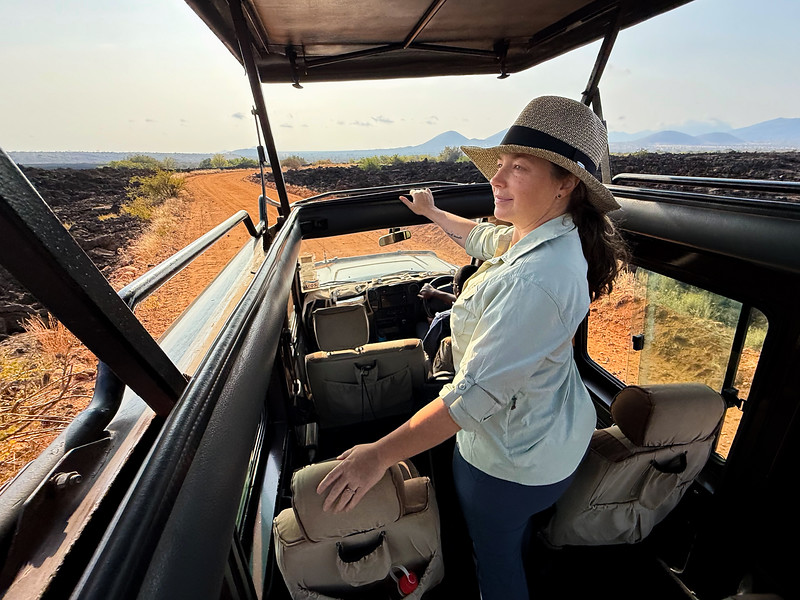 Lina Stock looking at the lava field in Tsavo West, Kenya