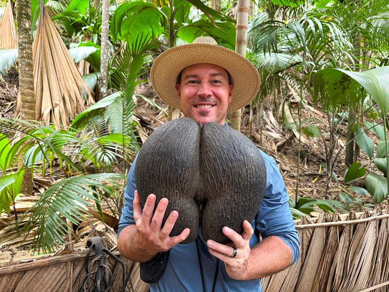 David Stock with a Coco de Mer in the Seychelles