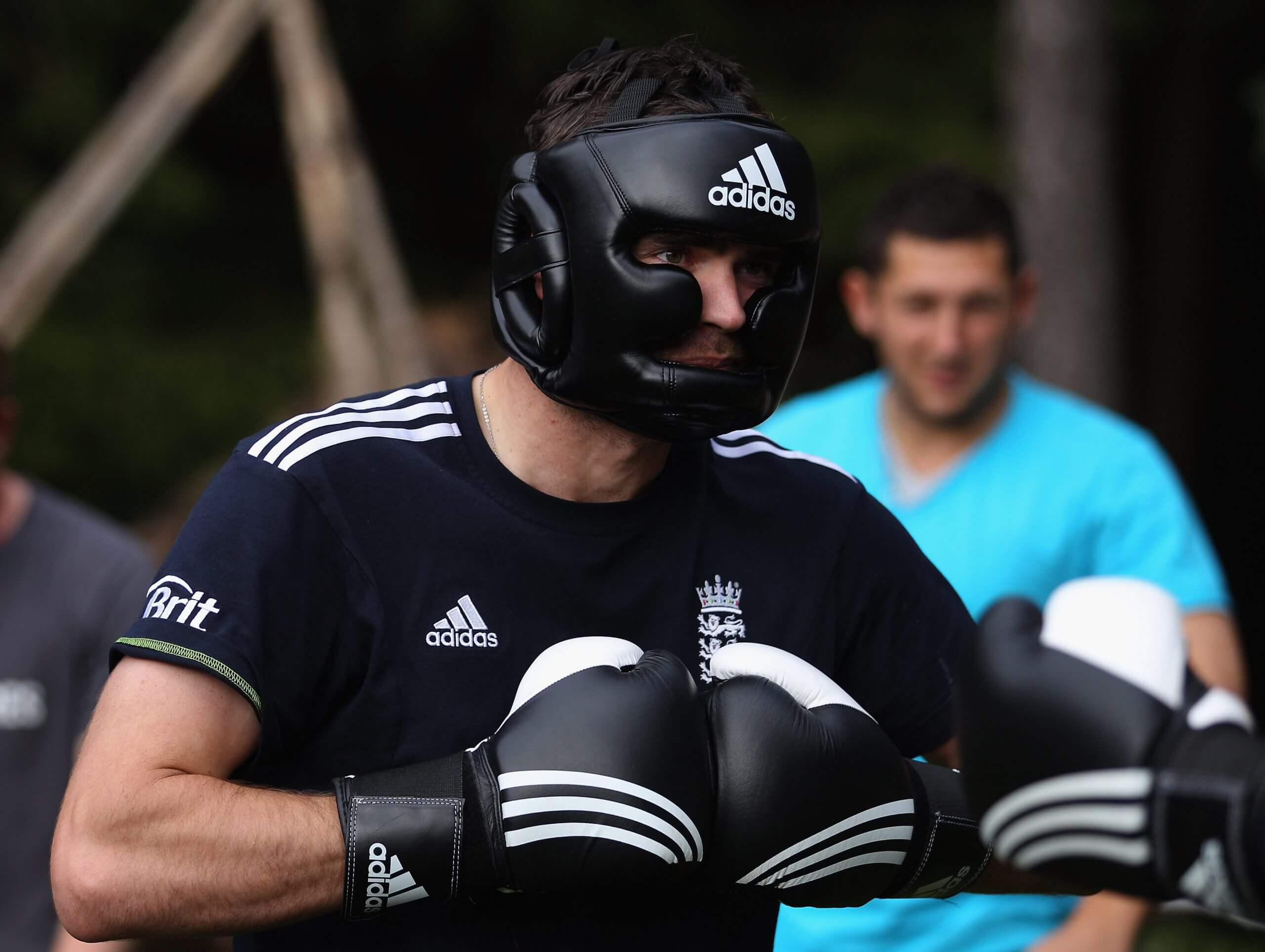 Jimmy Anderson wears his boxing protective gear ahead of a bout with Chris Tremlett