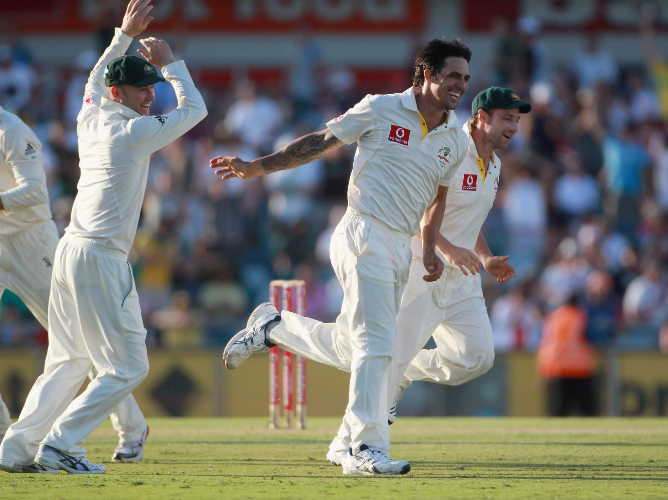 Mitchell Johnson wheels away in celebration after taking another England wicket in Perth