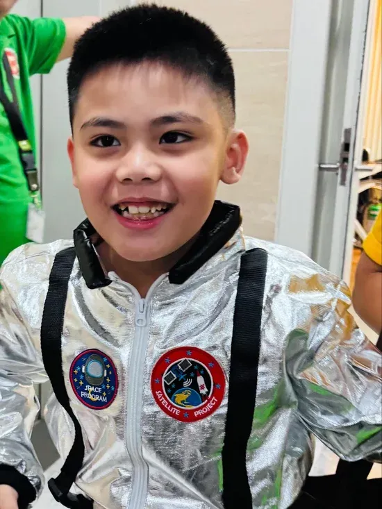 Setelan astronot Miguel