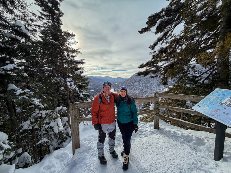 Lina and David Stock winter hiking at Parc National de la Jacques-Cartier in Quebec