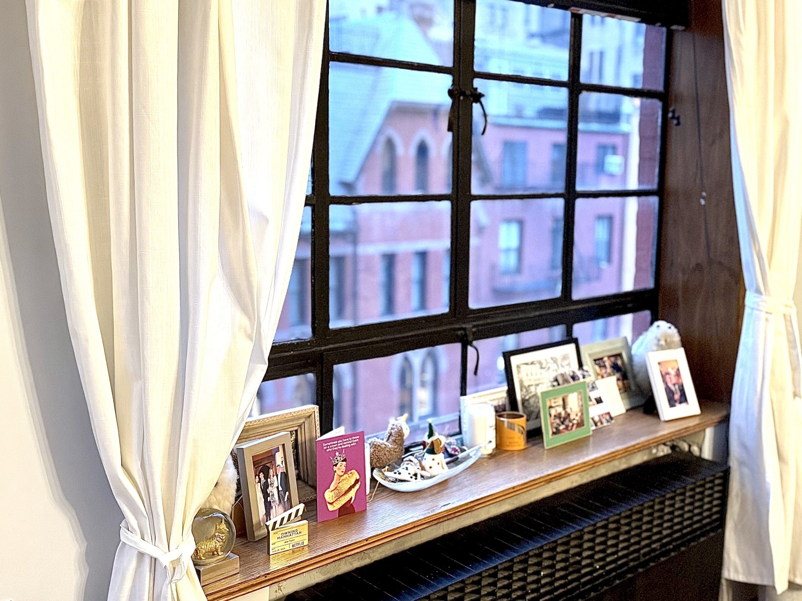 Family photos and a framed article Taylor was featured in are a few of the personal items on display in her home.