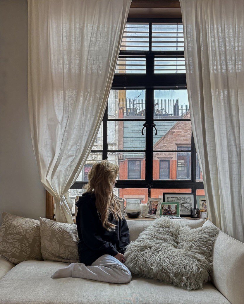 Taylor loves the apartment's casement windows.