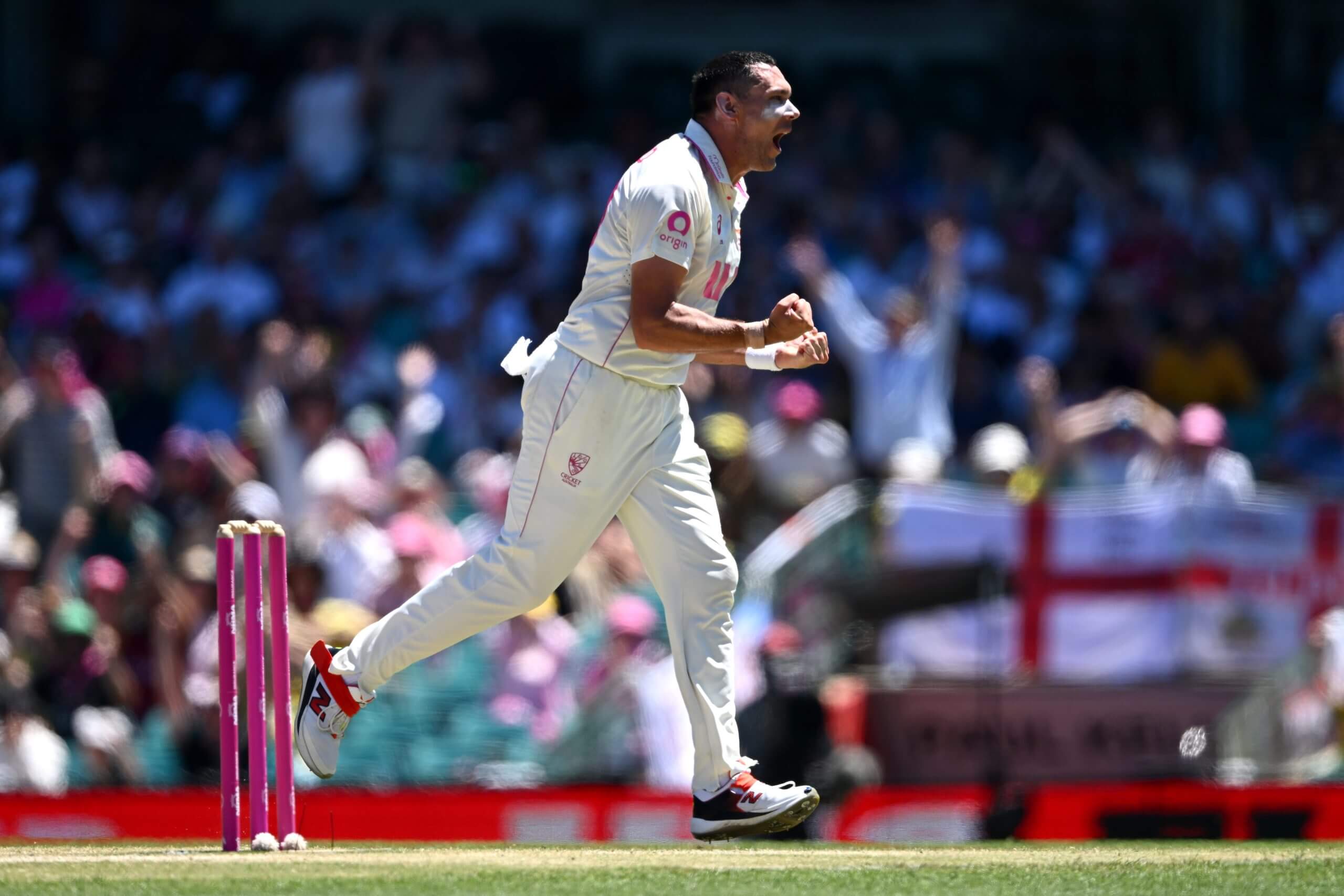 Scott Boland celebrates the wicket of Joe Root