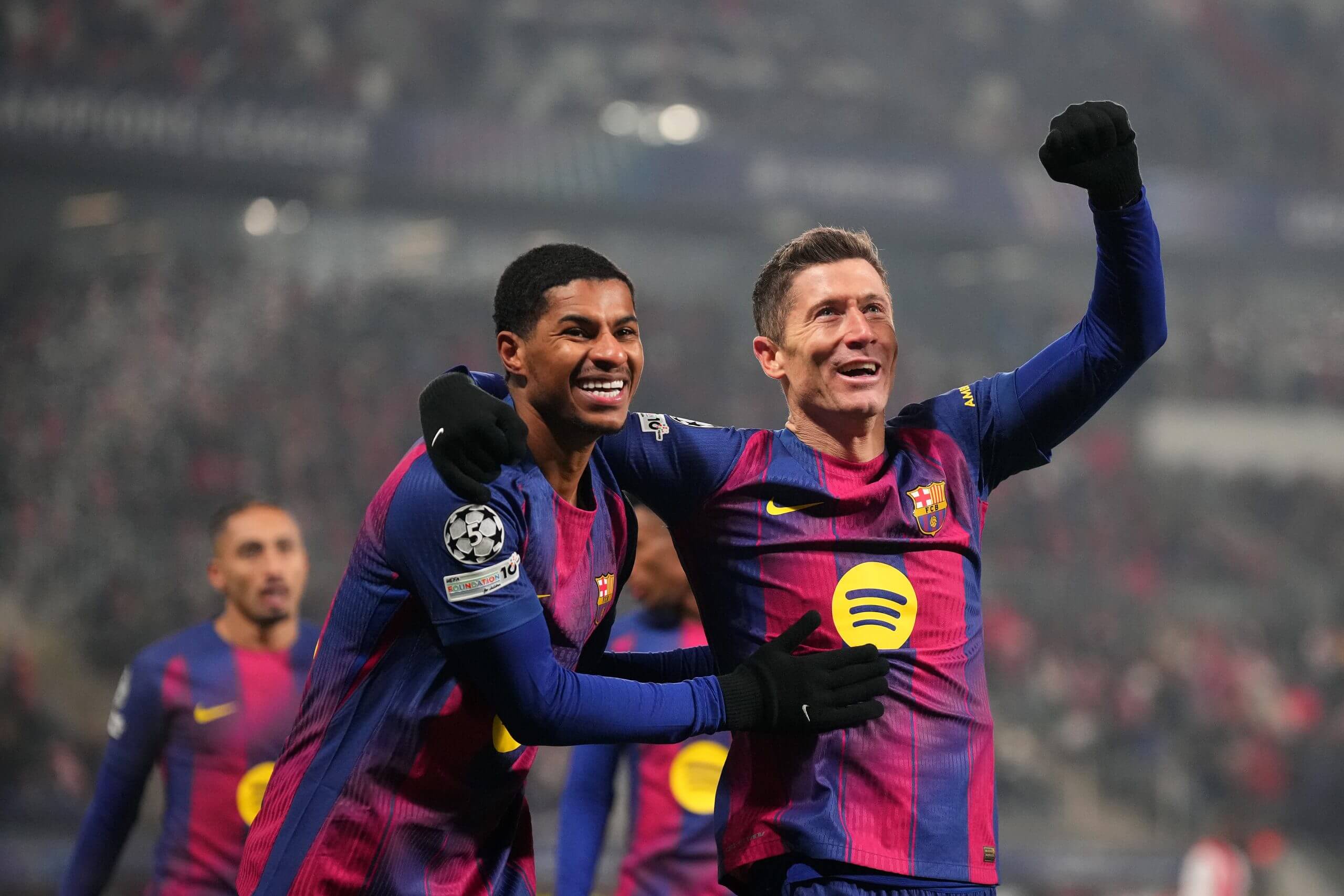 Rashford and Lewandowski celebrate